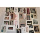 A selection of approximately 60 various open edition coloured etchings by Ian Laurie - female nude