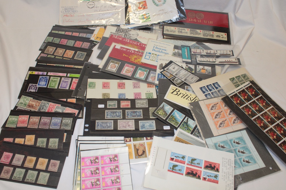 Various stock cards of British Empire and GB stamps together with presentation packs etc.