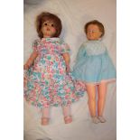 Two various composition musical dolls