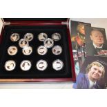 A case containing 14 various mint silver 2006 crowns "Great Britons" with certificates