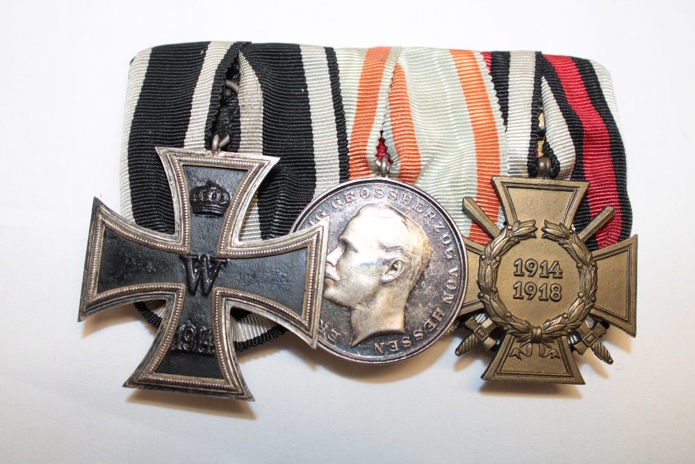 A group of three Imperial German First War medals :- First War German Iron Cross,