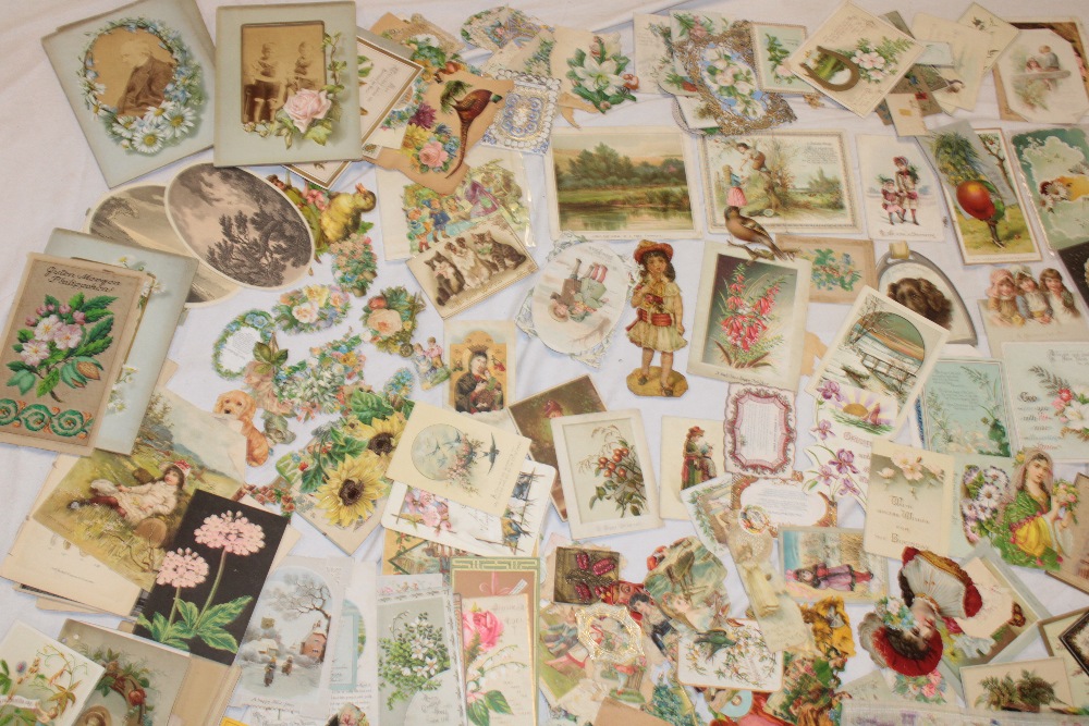 A large selection of various Victorian greetings cards,