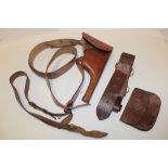 A First War German Officer's brown leather pistol holster by Hans Romer dated 1915 with attached