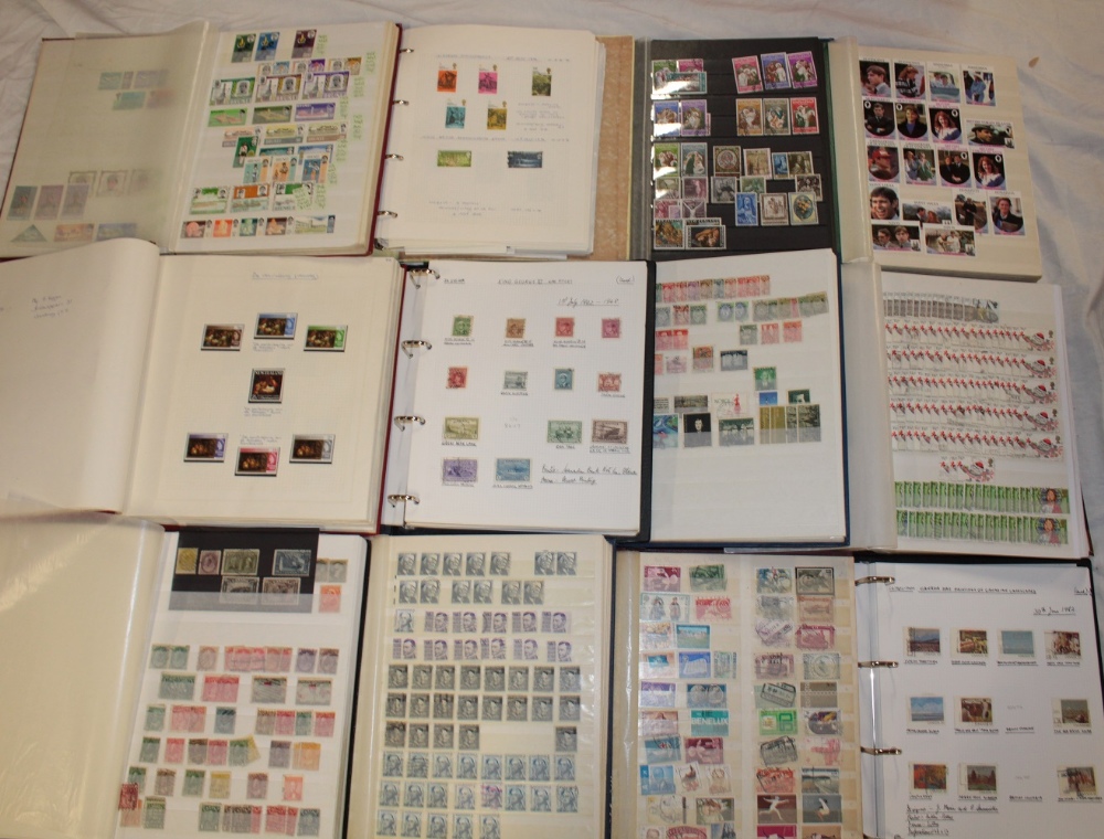 Twelve albums and stock books containing a large collection of GB and World stamps