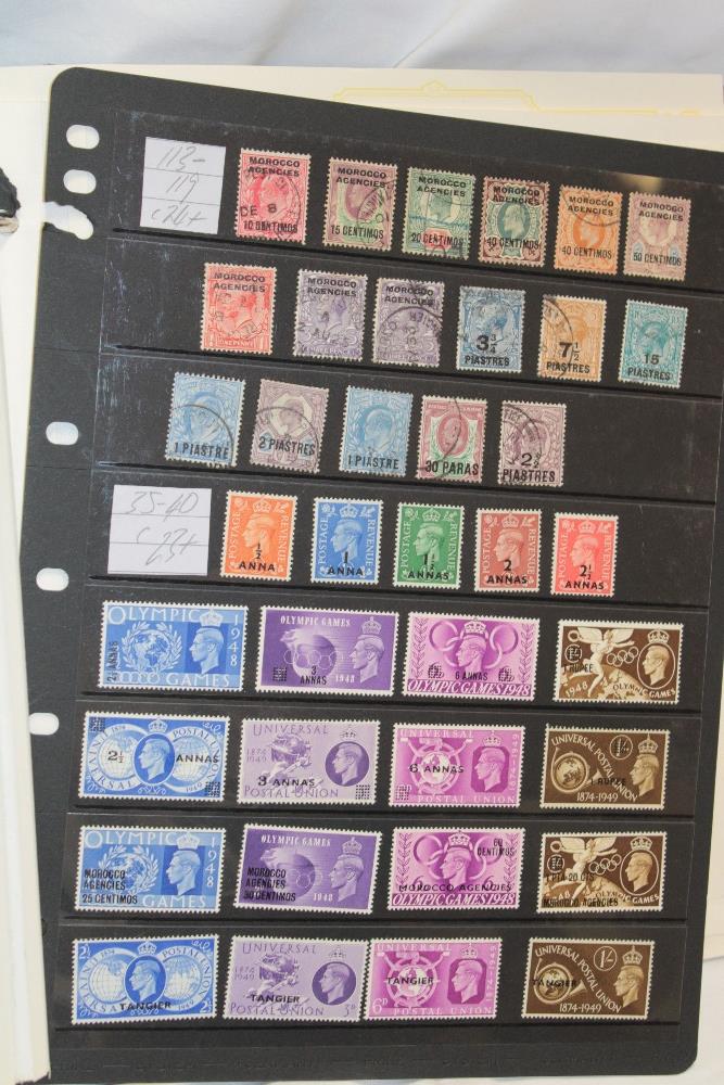 A folder album containing a collection of GB and British Commonwealth overprinted stamps including