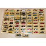 A selection of over 60 Lledo Days-Gone mint and boxed vehicles including commercial vehicles, cars,