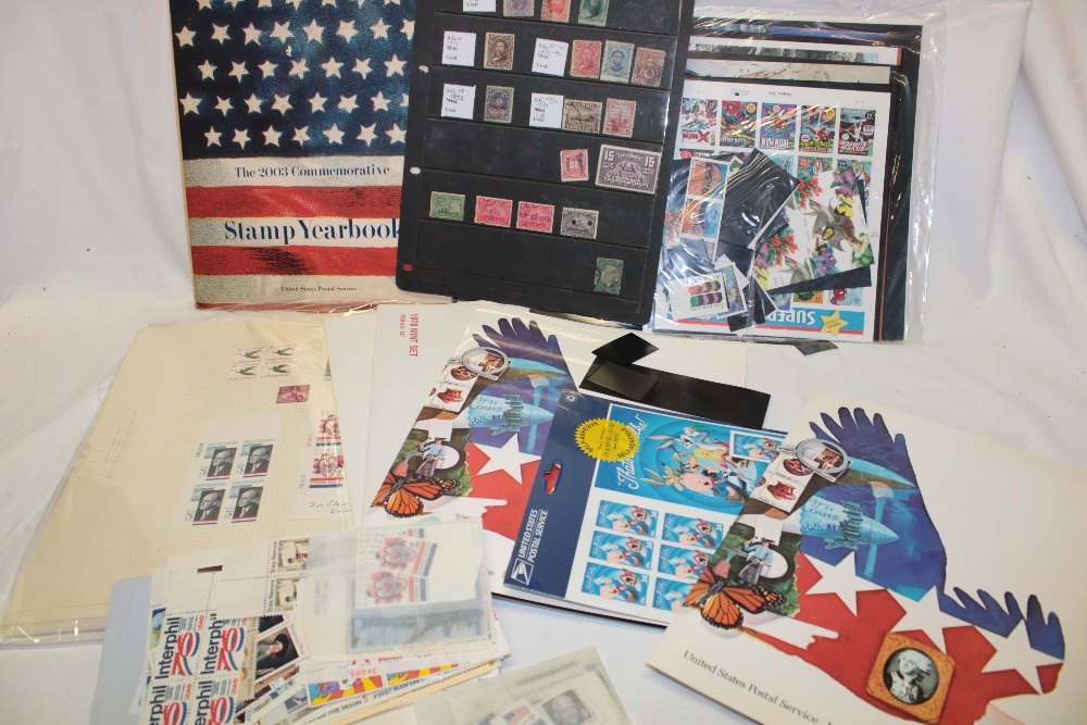 A large collection of United States of America stamps in blocks, year books, presentation packs,