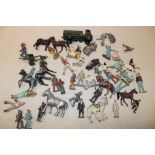 A selection of various painted lead soldier figures and figures on horseback together with various