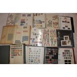 Fourteen albums and stock books containing a large selection of mixed GB and World stamps