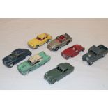 A selection of various diecast vehicles including Dinky Toys 157 Jaguar, Corgi Riley Pathfinder,