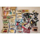 Two boxes of mainly mint and boxed diecast vehicles including Days-Gone, Bump and Go and others etc.