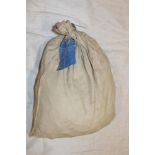 A sealed bag of unissued 1964 half pennies