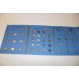 A folder containing a collection of silver 3d coins 1902-1944