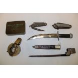 Two various military jack knives, a 1941 pocket compass (damaged), Eastern-style dagger,