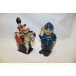 A tin-plate clockwork drumming soldier on horseback and a clockwork tin-plate policeman figure (2)