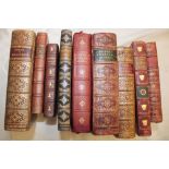 A selection of leather bound volumes including Burns poetical works,