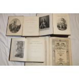 Various leather bound volumes including The Family Devotional Bible,