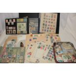 A box containing a large selection of various World stamps in albums, loose, packets,