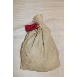 A sealed bag of unissued 1965 pennies