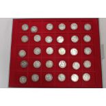 A collection of 30 various silver shillings 1826-1901 in display tray