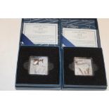 Two 2022 solid platinum stamp replica medallions,