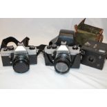 Two Praktica MTL5B cameras and a Kodak 620 box camera