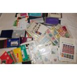 A selection of Jersey and Guernsey mint stamps together with folder albums of presentation packs,