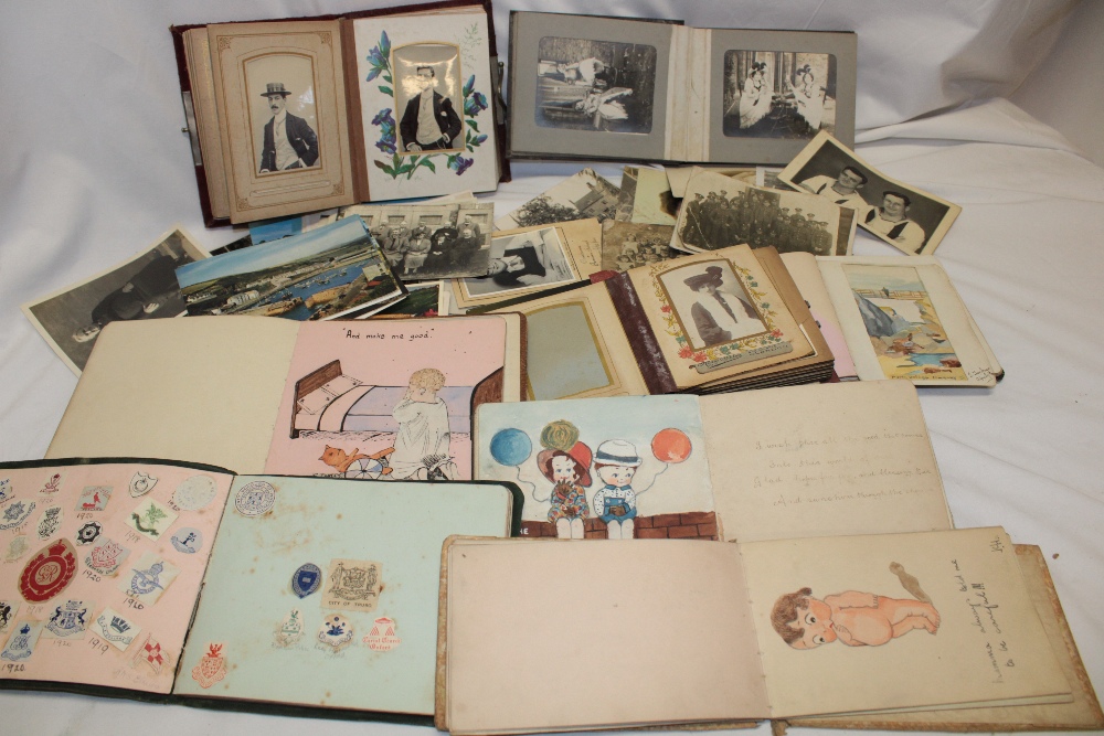 Two small family photograph albums containing carte de visites,