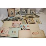 Two small family photograph albums containing carte de visites,