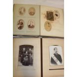 Two family photograph albums containing a total of over 90 various Victorian cabinet photographs