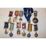A selection of gilt and enamelled Royal Ancient Order of Buffaloes medals and insignia