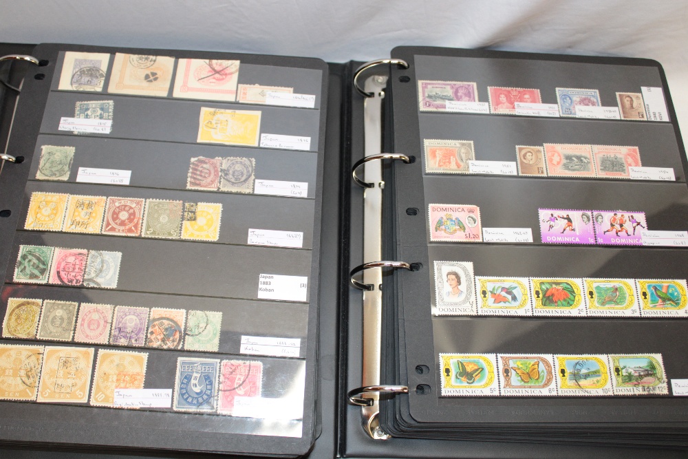 Two large albums containing a selection of World stamps mint and used