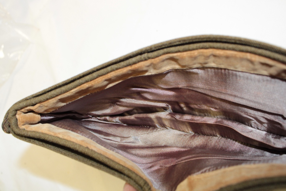 An Officer's khaki side hat of the Duke of Cornwall's Light Infantry with bronze DCLI cap badge - Image 2 of 2