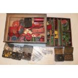 A selection of red/green Meccano with various accessories