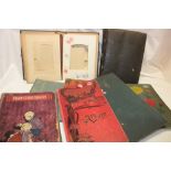 Two various empty family photographs albums and a small selection of empty postcard albums,
