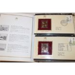 A collection of 40 22ct gold replicas of British stamps mounted on First Day covers,