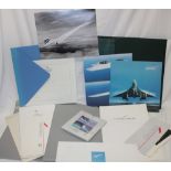 A selection of various Concorde memorabilia including two Concorde passenger wallets with menus,