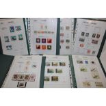 A collection of Poland stamps contained in four folder albums