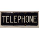 An enamel rectangular sign "Telephone",