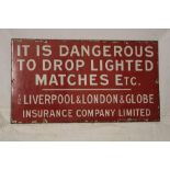 An enamel rectangular warning sign "It Is Dangerous To Drop Lighted Matches,