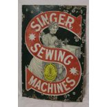 An enamel rectangular advertising sign "Singer Sewing Machines",