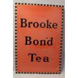 A large enamel rectangular advertising sign "Brooke Bond Tea",