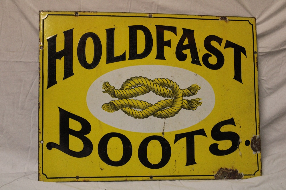 An old enamel advertising sign "Holdfast Boots",