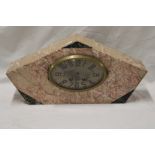 A French Art Deco mantel clock with gilt oval dial in pink marble angular case,