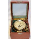 A good quality brass marine chronometer by Thomas Mercer with silvered dial in mahogany glazed