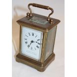 A small carriage clock by P Orr & Sons Ltd.