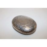 An Edward VII silver oval snuff box with sprung hinged lid and engraved decoration,