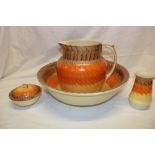 A 1930s Art Deco jug and bowl set by Myott with brown,