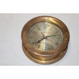 A US Maritime Commission ship's clock with silvered circular dial by The Chelsea Clock Co Boston in