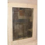 An old rectangular wall mirror in painted rectangular frame,